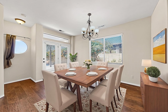 1128 San Augustin Dr, Bernalillo, NM 87004 - dining room with a chandelier and dark wood-type flooring