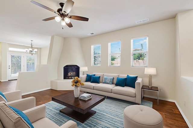 1128 San Augustin Dr, Bernalillo, NM 87004 - living area with a chandelier, wood finished floors, and ceiling fan