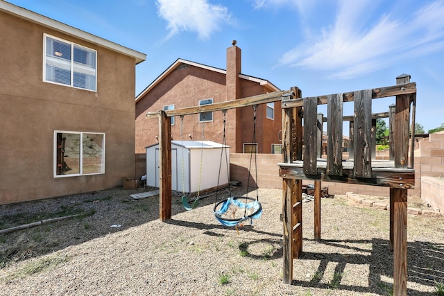 1230 Carrizo St NW, Los Lunas, NM 87031 - view of yard featuring a shed