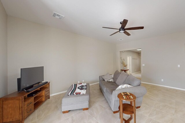 4813 Guadalupe Peak St SW, Los Lunas, NM 87031 - living area with a ceiling fan and baseboards