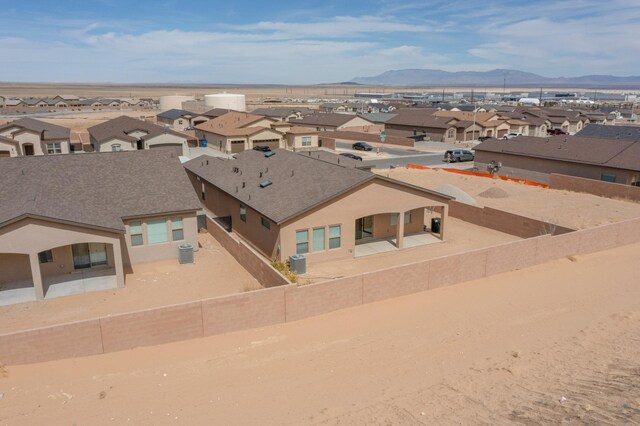 4813 Guadalupe Peak St SW, Los Lunas, NM 87031 - aerial perspective of suburban area featuring mountains