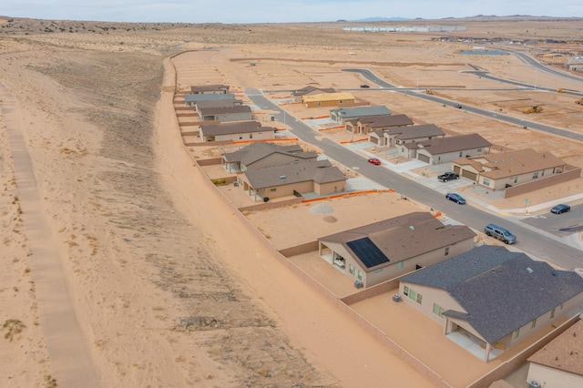 4813 Guadalupe Peak St SW, Los Lunas, NM 87031 - aerial perspective of suburban area with a desert landscape and mountains