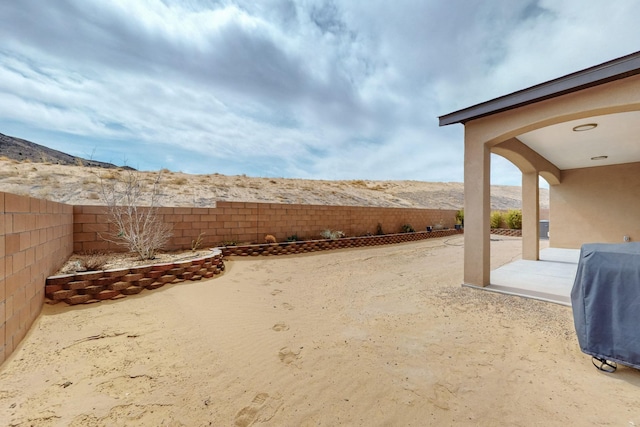4813 Guadalupe Peak St SW, Los Lunas, NM 87031 - fenced backyard with a patio
