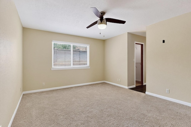 6940 Cherry Hills Loop NE, Albuquerque, NM 87111 - unfurnished room featuring dark carpet and ceiling fan
