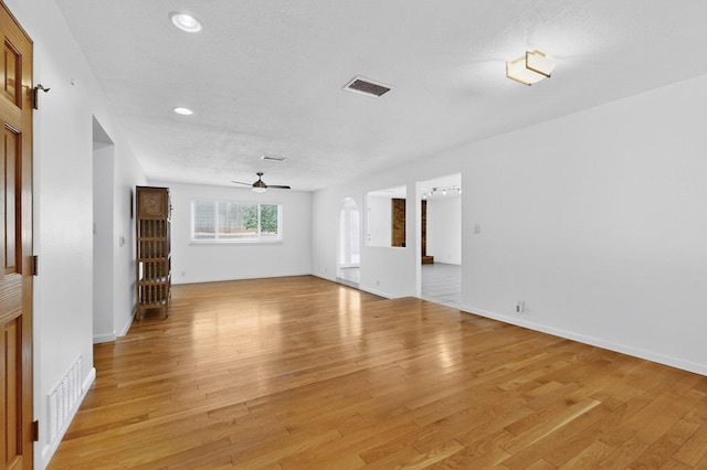 6940 Cherry Hills Loop NE, Albuquerque, NM 87111 - unfurnished living room with a ceiling fan, light wood-style floors, and recessed lighting