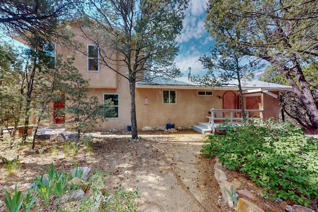 19 Villa Del Monte Loop, Tijeras, NM 87059 - back of house with stucco siding