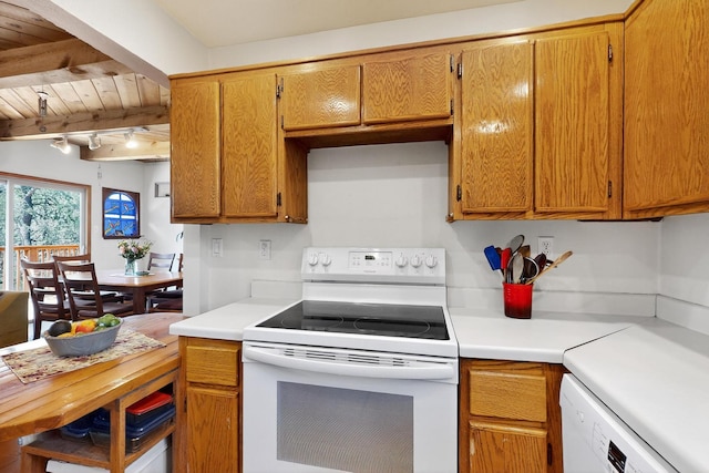 19 Villa Del Monte Loop, Tijeras, NM 87059 - kitchen with white appliances, light countertops, a wooden ceiling with exposed beams, and brown cabinets