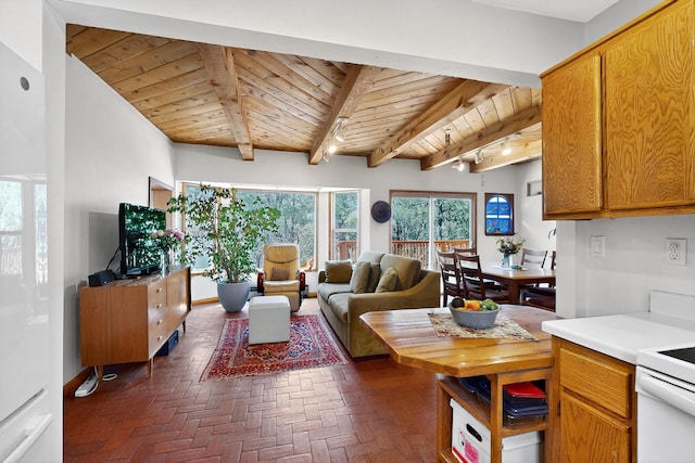 19 Villa Del Monte Loop, Tijeras, NM 87059 - living room with a wood ceiling with exposed beams and brick flooring
