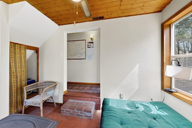 19 Villa Del Monte Loop, Tijeras, NM 87059 - bedroom featuring wood ceiling and brick flooring