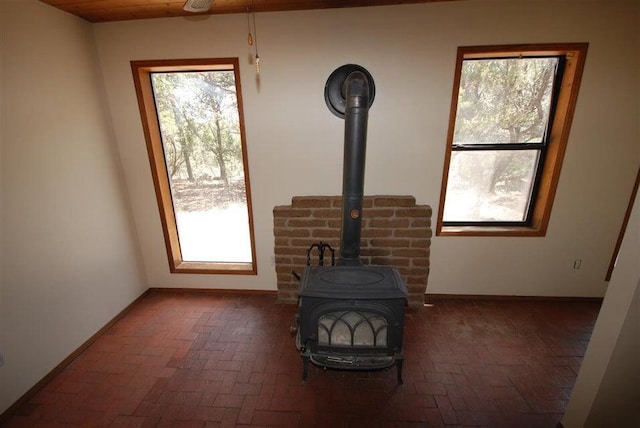 19 Villa Del Monte Loop, Tijeras, NM 87059 - detailed view of a wood stove and baseboards