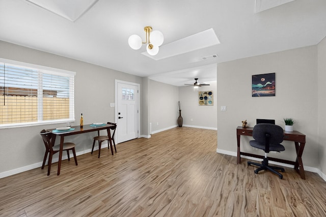 1259 8th St NW, Albuquerque, NM 87102 - office featuring light wood-style flooring, a skylight, and ceiling fan
