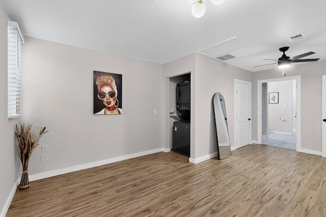 1259 8th St NW, Albuquerque, NM 87102 - unfurnished living room with a ceiling fan, light wood finished floors, and attic access