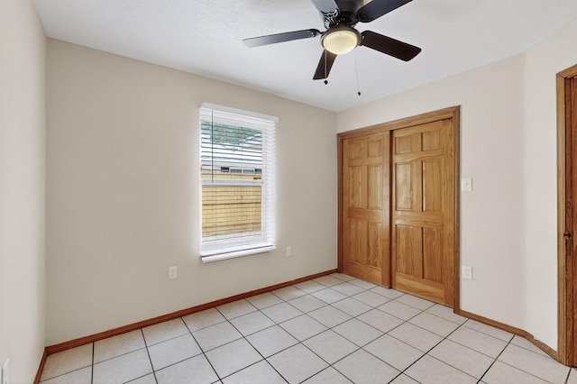 1259 8th St NW, Albuquerque, NM 87102 - unfurnished bedroom with a closet and a ceiling fan