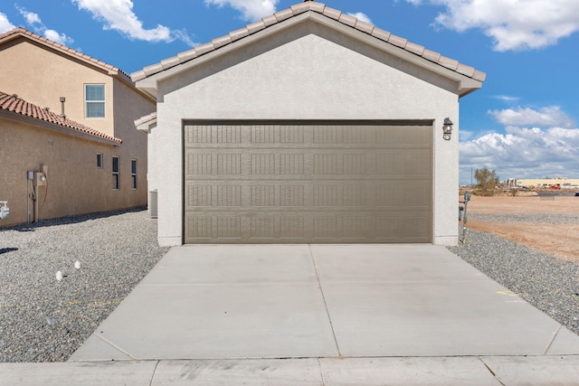 5627 Sagan Loop SE, Albuquerque, NM 87106 - garage featuring concrete driveway