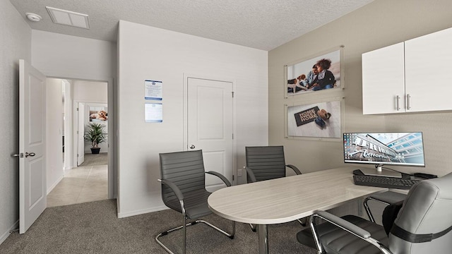 5627 Sagan Loop SE, Albuquerque, NM 87106 - carpeted office space featuring a textured ceiling and tile patterned floors