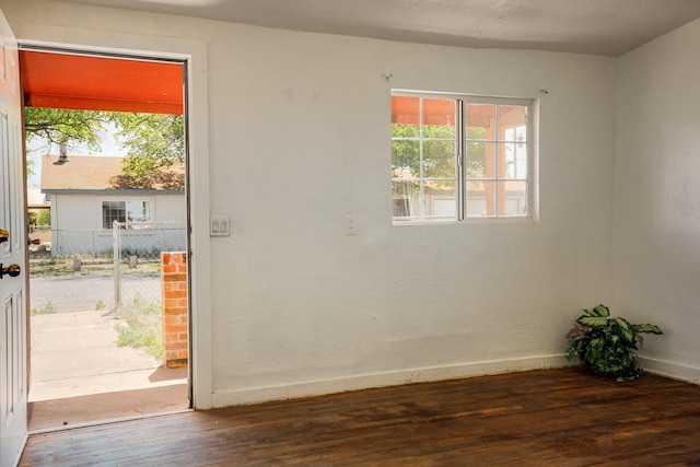 1601 7th St, Moriarty, NM 87035 - entrance foyer with healthy amount of natural light and wood finished floors
