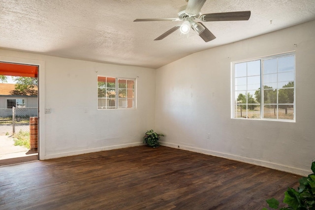 1601 7th St, Moriarty, NM 87035 - empty room featuring wood finished floors, a textured ceiling, and a ceiling fan