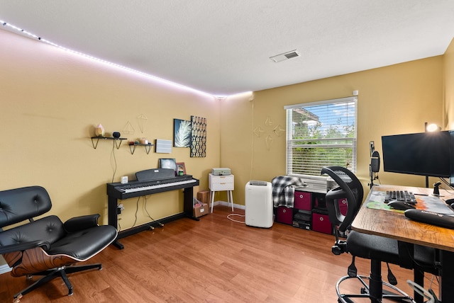6404 Gambel Quail Rd NE, Rio Rancho, NM 87144 - office area featuring light wood-style floors and baseboards