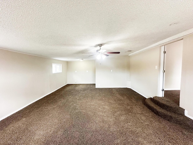213 Green Valley Rd NW, Los Ranchos, NM 87107 - spare room with ceiling fan, dark carpet, and a textured ceiling