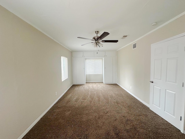 213 Green Valley Rd NW, Los Ranchos, NM 87107 - carpeted spare room with ceiling fan, ornamental molding, and a smoke detector