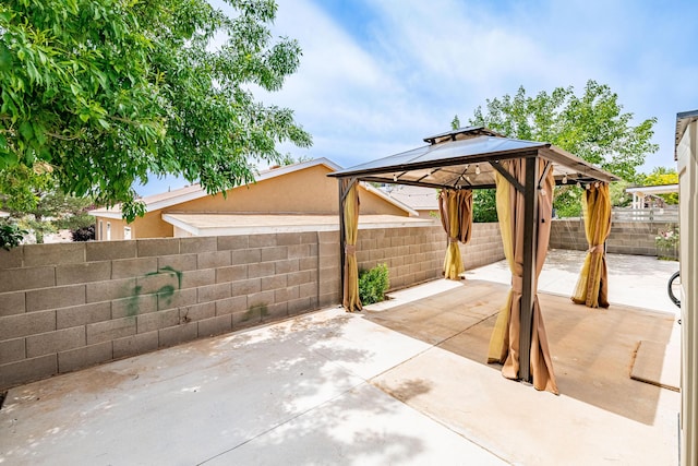 3742 Cattle Dr NE, Rio Rancho, NM 87144 - fenced backyard featuring a patio and a gazebo