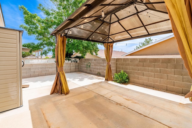3742 Cattle Dr NE, Rio Rancho, NM 87144 - fenced backyard featuring a patio area and a gazebo