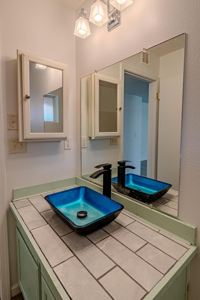 3742 Cattle Dr NE, Rio Rancho, NM 87144 - bathroom featuring vanity