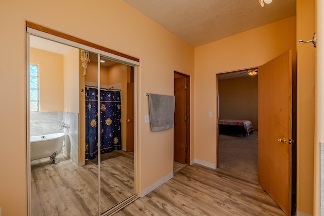 300 Thompson, Moriarty, NM 87035 - hall featuring wood finished floors