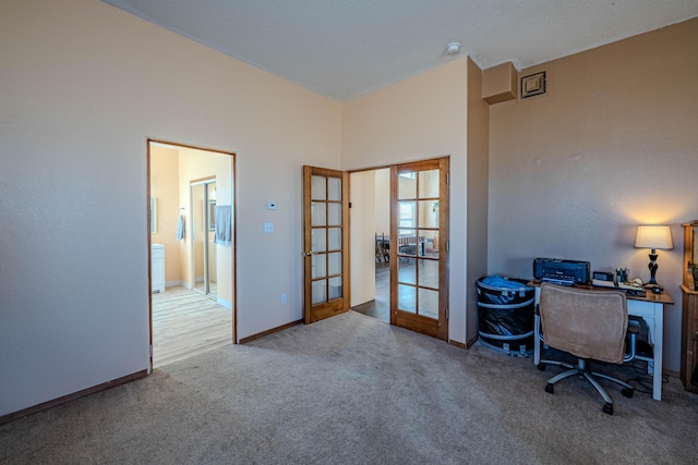 300 Thompson, Moriarty, NM 87035 - carpeted office featuring french doors and baseboards