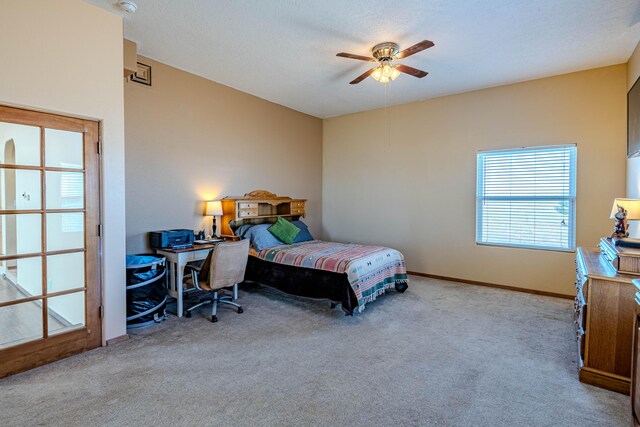 300 Thompson, Moriarty, NM 87035 - bedroom with carpet flooring, a ceiling fan, and a desk