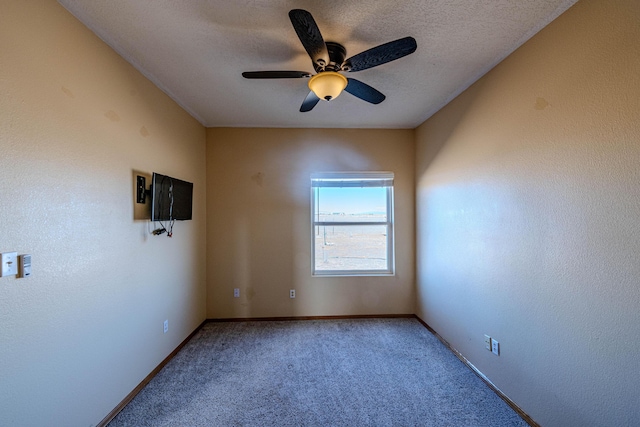300 Thompson, Moriarty, NM 87035 - carpeted spare room featuring a ceiling fan and baseboards