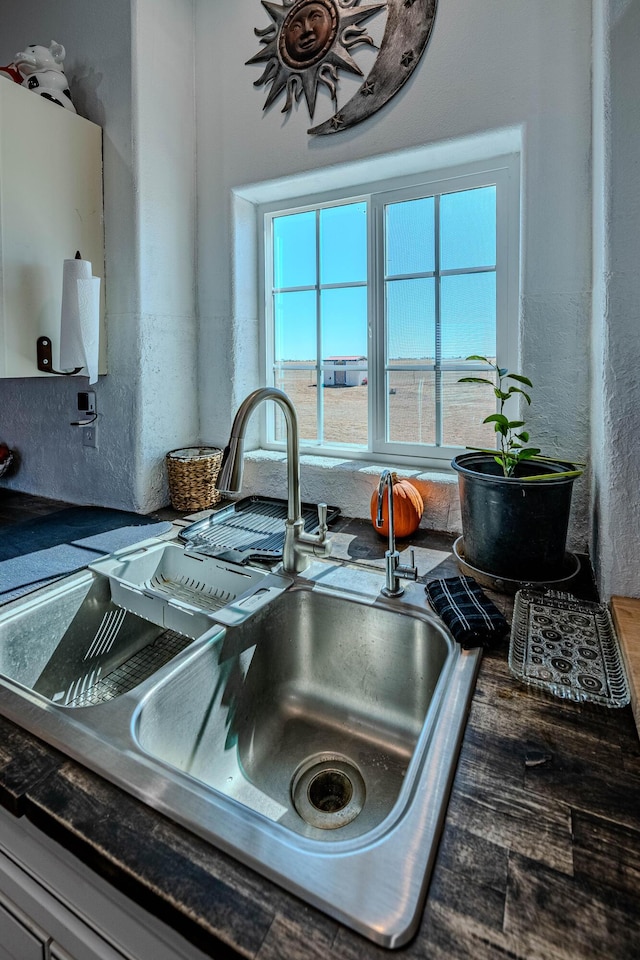 300 Thompson, Moriarty, NM 87035 - kitchen view of a sink and dark countertops