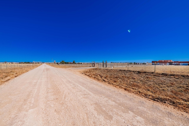 300 Thompson, Moriarty, NM 87035 - view of dirt / gravel road with a view of rural / pastoral area