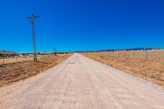 300 Thompson, Moriarty, NM 87035 - view of dirt / gravel road with a rural view