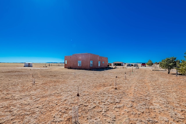 300 Thompson, Moriarty, NM 87035 - view of yard featuring a rural view