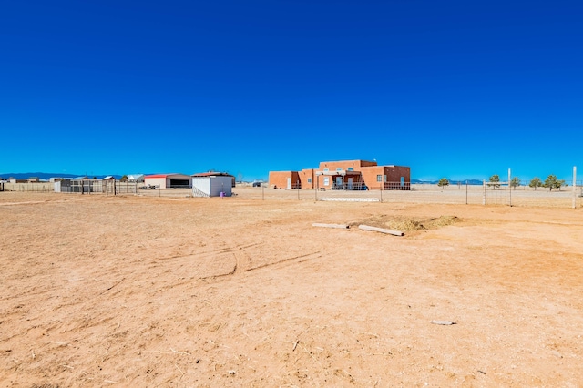 300 Thompson, Moriarty, NM 87035 - view of yard featuring an outdoor structure