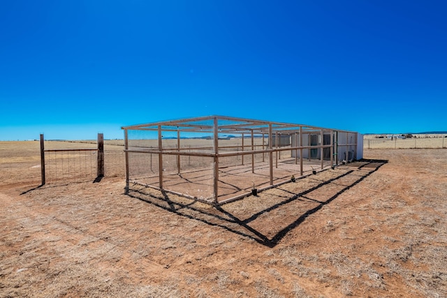 300 Thompson, Moriarty, NM 87035 - view of yard with an outbuilding, a view of countryside, and exterior structure