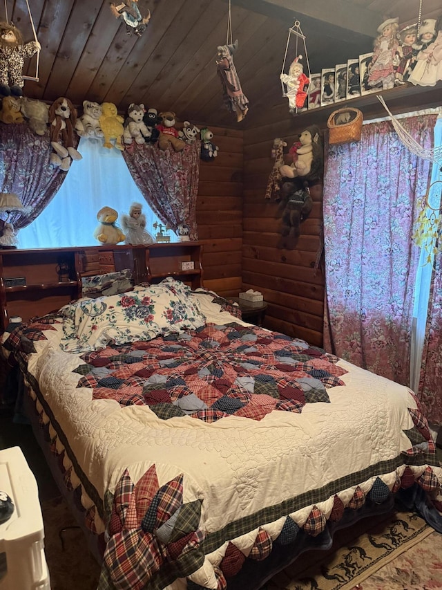 455 Obsidian Rd, Jemez Springs, NM 87025 - bedroom with wooden ceiling, log walls, and lofted ceiling