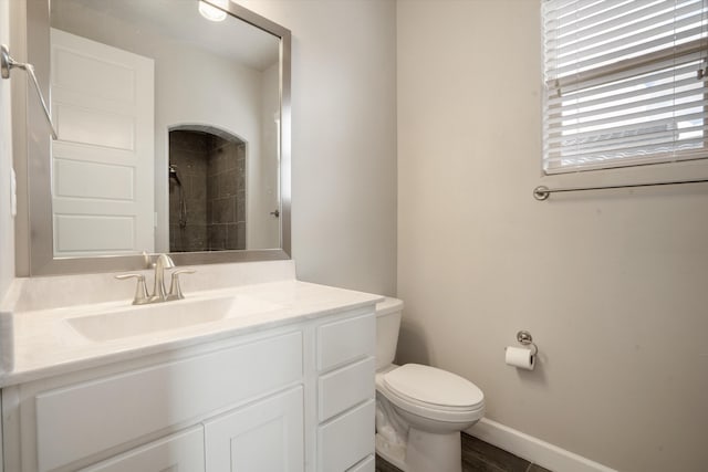 205 Silent Spring Dr NE, Rio Rancho, NM 87124 - full bath featuring a tile shower, vanity, and wood finished floors