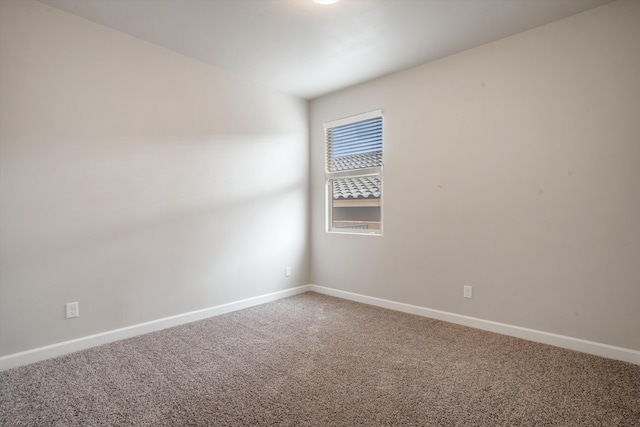 205 Silent Spring Dr NE, Rio Rancho, NM 87124 - carpeted empty room featuring baseboards