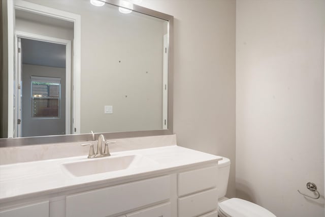 205 Silent Spring Dr NE, Rio Rancho, NM 87124 - bathroom featuring toilet and vanity