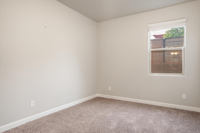 205 Silent Spring Dr NE, Rio Rancho, NM 87124 - carpeted empty room featuring baseboards