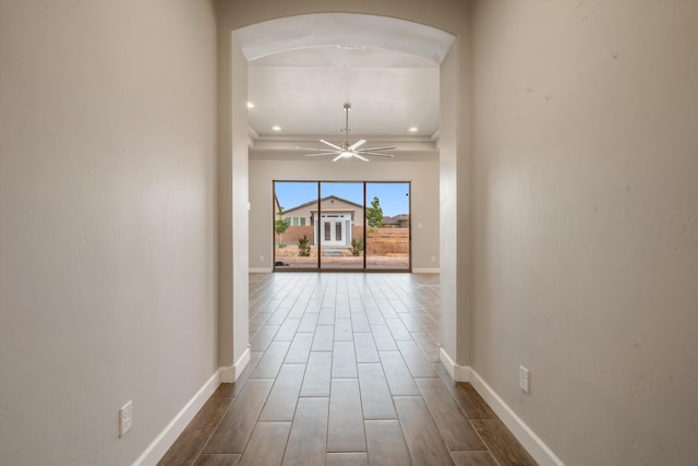 205 Silent Spring Dr NE, Rio Rancho, NM 87124 - corridor featuring arched walkways, dark wood-style floors, and recessed lighting