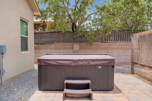 205 Silent Spring Dr NE, Rio Rancho, NM 87124 - fenced backyard featuring a hot tub and a patio