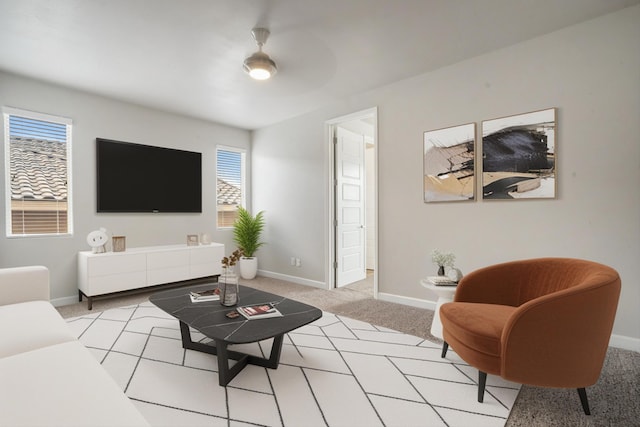 205 Silent Spring Dr NE, Rio Rancho, NM 87124 - living area featuring light carpet, plenty of natural light, and a ceiling fan