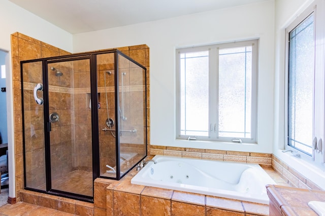 930 Titus Loop, Bosque Farms, NM 87068 - full bath with a whirlpool tub, a stall shower, and plenty of natural light