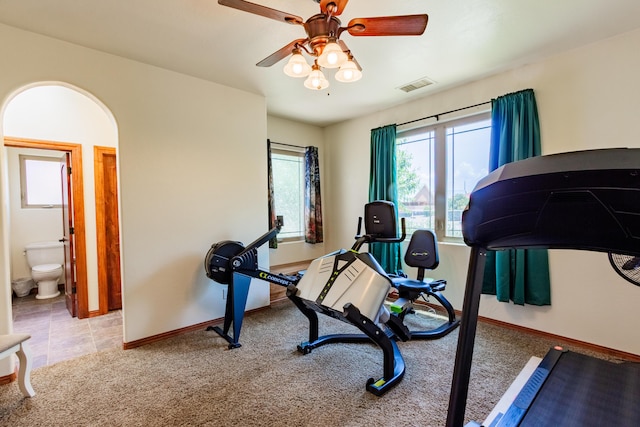 930 Titus Loop, Bosque Farms, NM 87068 - workout area featuring carpet, ceiling fan, and arched walkways