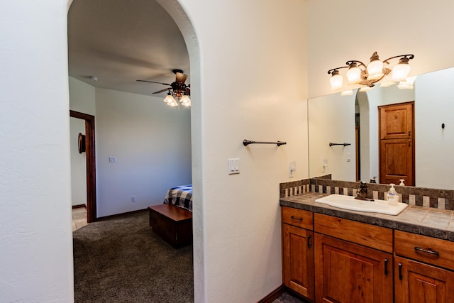 930 Titus Loop, Bosque Farms, NM 87068 - ensuite bathroom with vanity and a ceiling fan