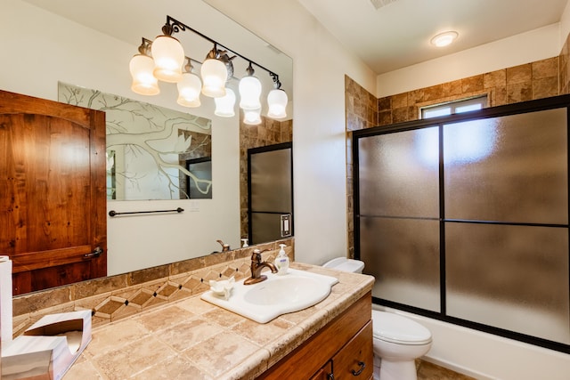 930 Titus Loop, Bosque Farms, NM 87068 - bathroom with vanity and shower / bath combination with glass door