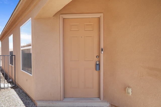 1944 Sierra Norte Loop NE, Rio Rancho, NM 87144 - view of exterior entry with stucco siding